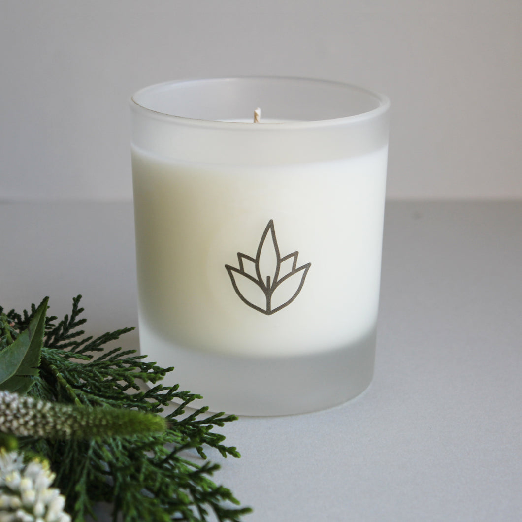 Urban Garden Scents essential oil and soy wax glass candle. With Cedarwood & Geranium this scent blend is warm, earthy and soothing.